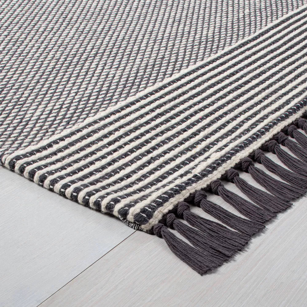 7'x 10' Textured Border Stripe Area Rug Railroad Gray - Hearth & Hand with Magnolia