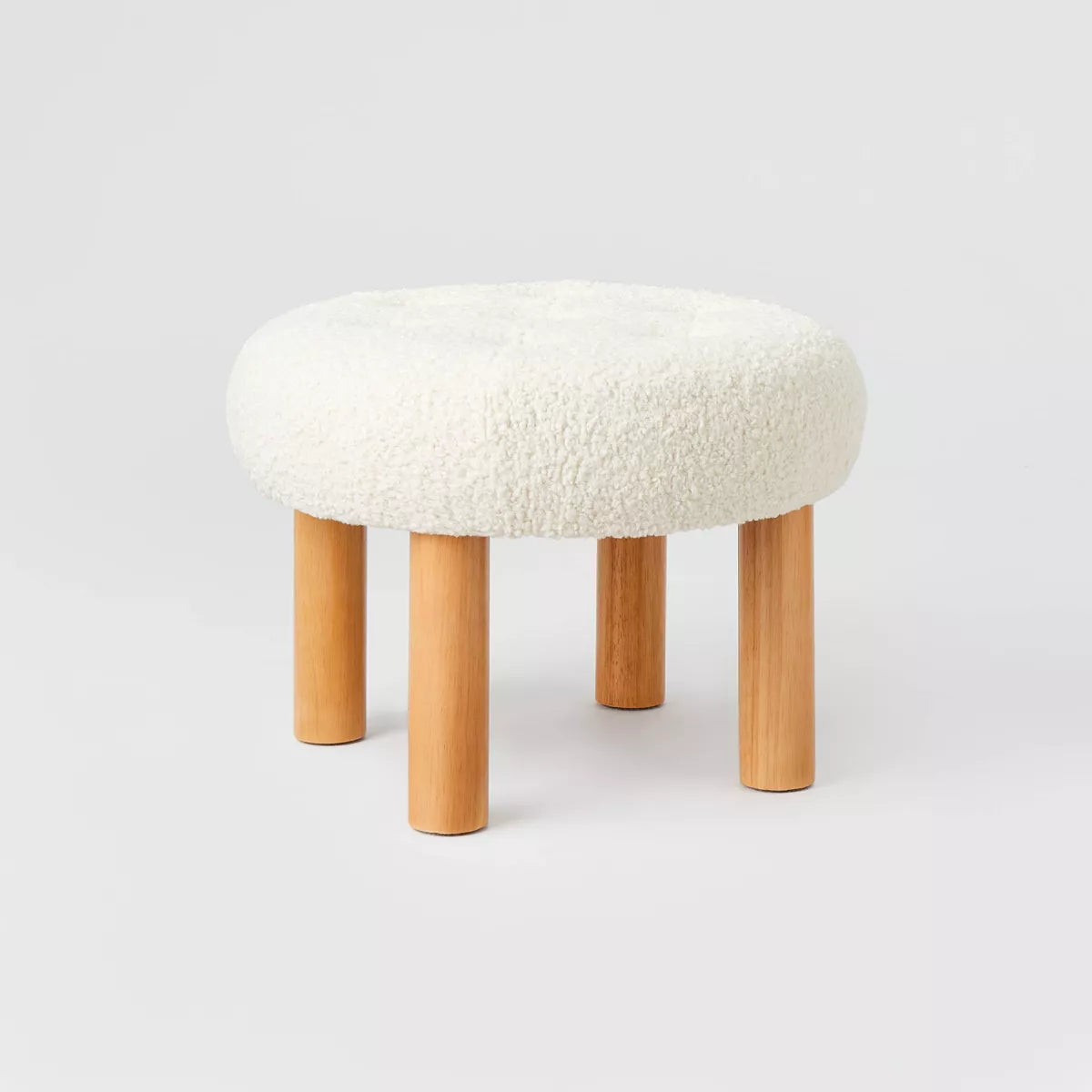 Kessler Round Tufted Faux Shearling Ottoman with Wood Legs Cream - Threshold designed with Studio McGee